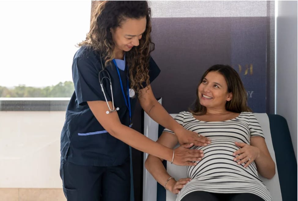 Doctor caring for a pregnant woman